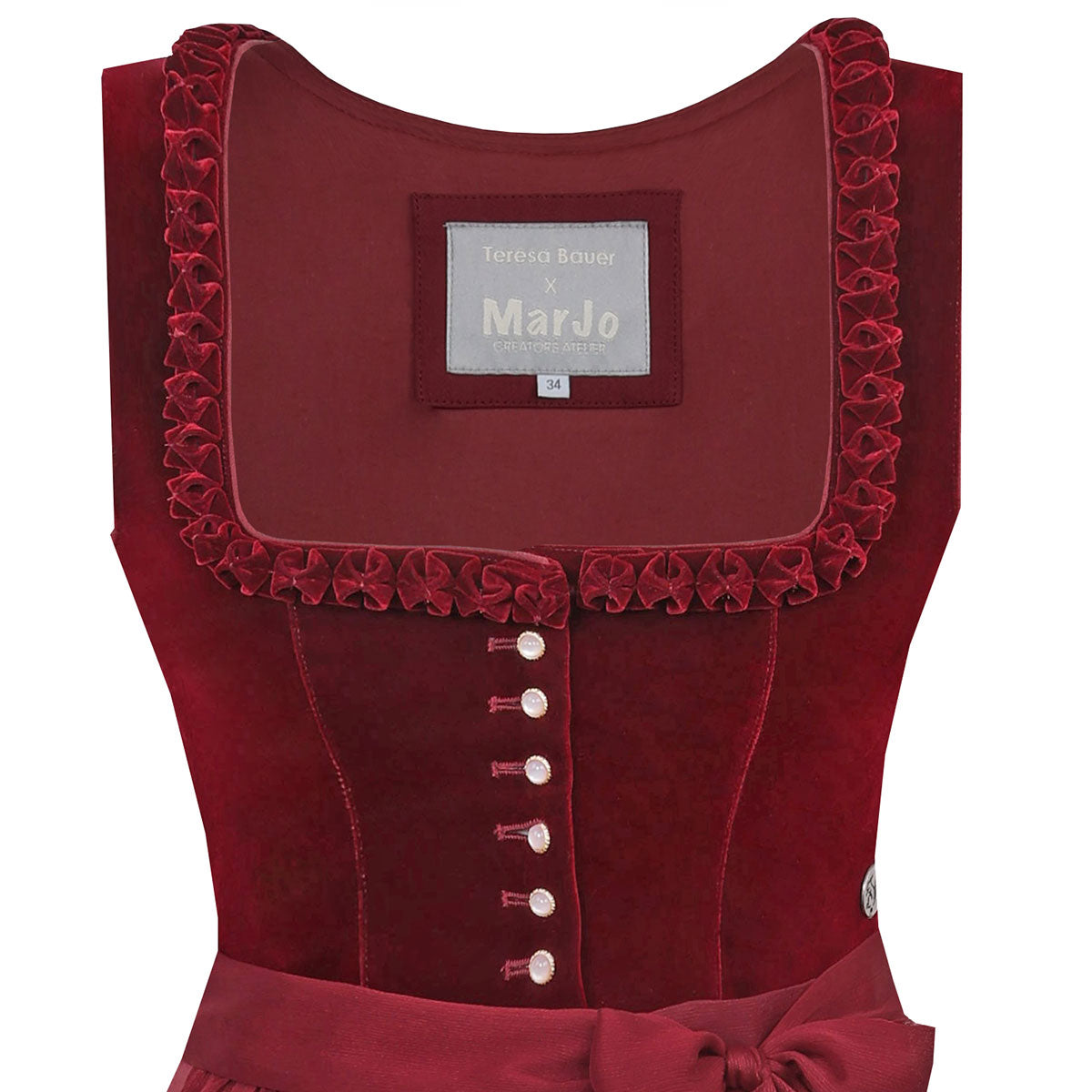 Dirndl Cherry Chante von Teresa Bauer. Rotes Dirndl mit Froschgoscherl, Knöpfe in Glas Gold Optik. Der Hingucker 2025 auf der Wiesn. Detailansicht Mieder mit Froschgoscherl und Knöpfe